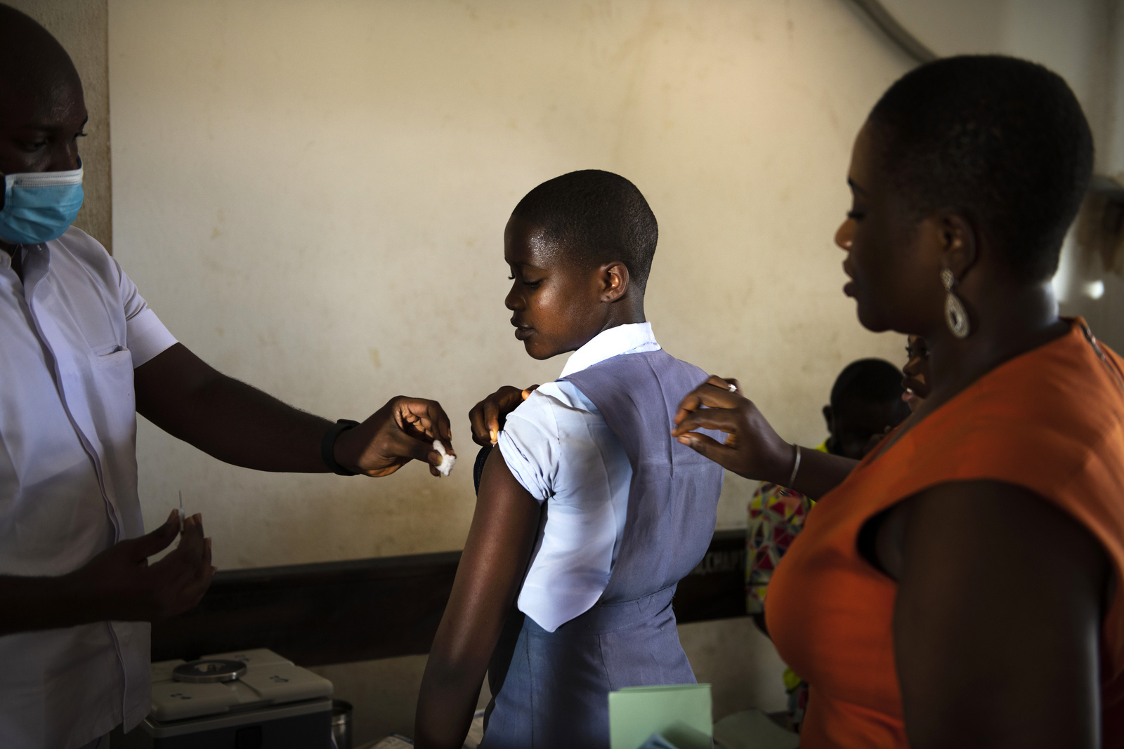 A young child receives a yellow fever vaccine, in the Delta State of Nigeria