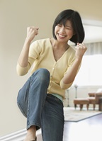 Woman in celebratory move