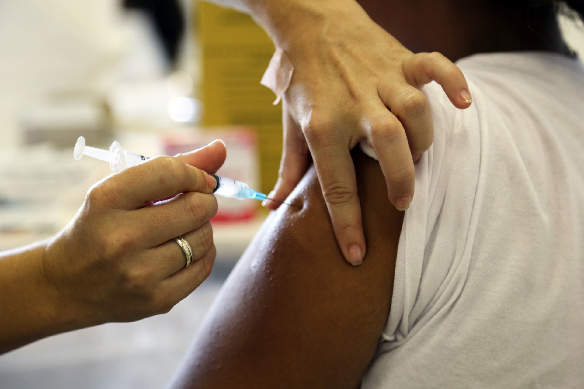 A young girl being vaccinated against HPV, in Sao Paulo, Brazil
