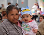 A mother in Mexico, holding her young baby