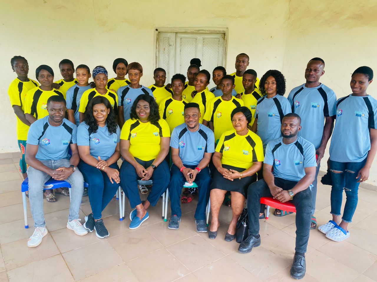 A group of youth smiling to camera in Abia State, Nigeria